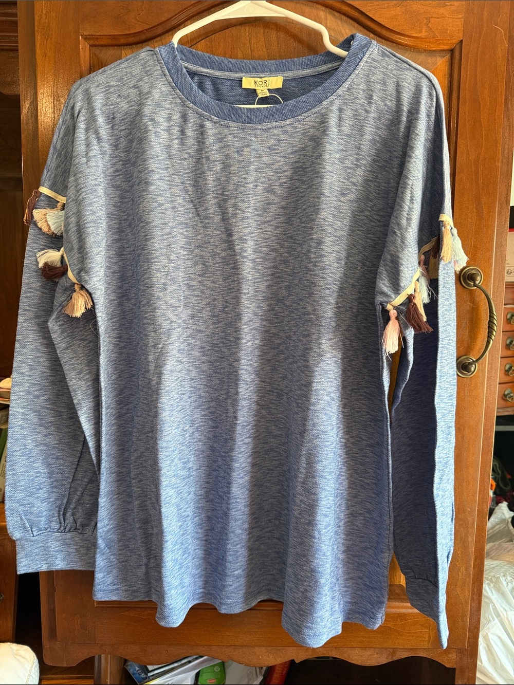 Kori Heather Blue Long Sleeve Top with Tassel Accents